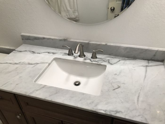 Marble vanity top with undermount sink and new faucet