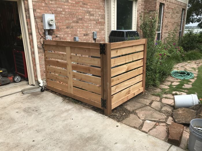 Custom cedar slat equipment screen with gate